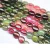 Bead, Tourmaline (Natural), 10-12mm Smooth Oval,  B- Grade, Mohs Hardness 7, Sold Per 7inch Strand - Tourmaline (tur-mah-Leen) is a crystal boron silicate mineral compounded with elements such as aluminium, iron, magnesium, sodium, lithium, or potassium. Tourmaline is classified as a semi-precious stone and the gemstone comes in a wide variety of colors. 